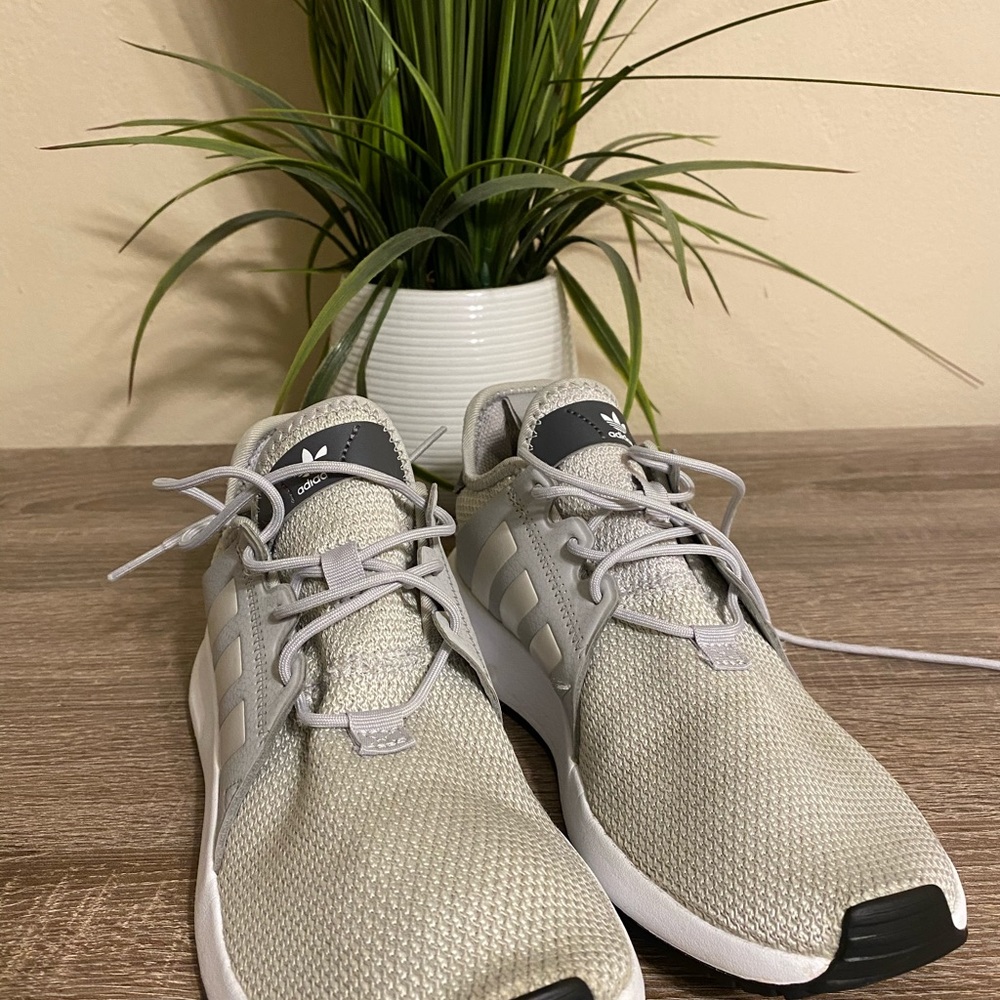Used gray adidas shoes